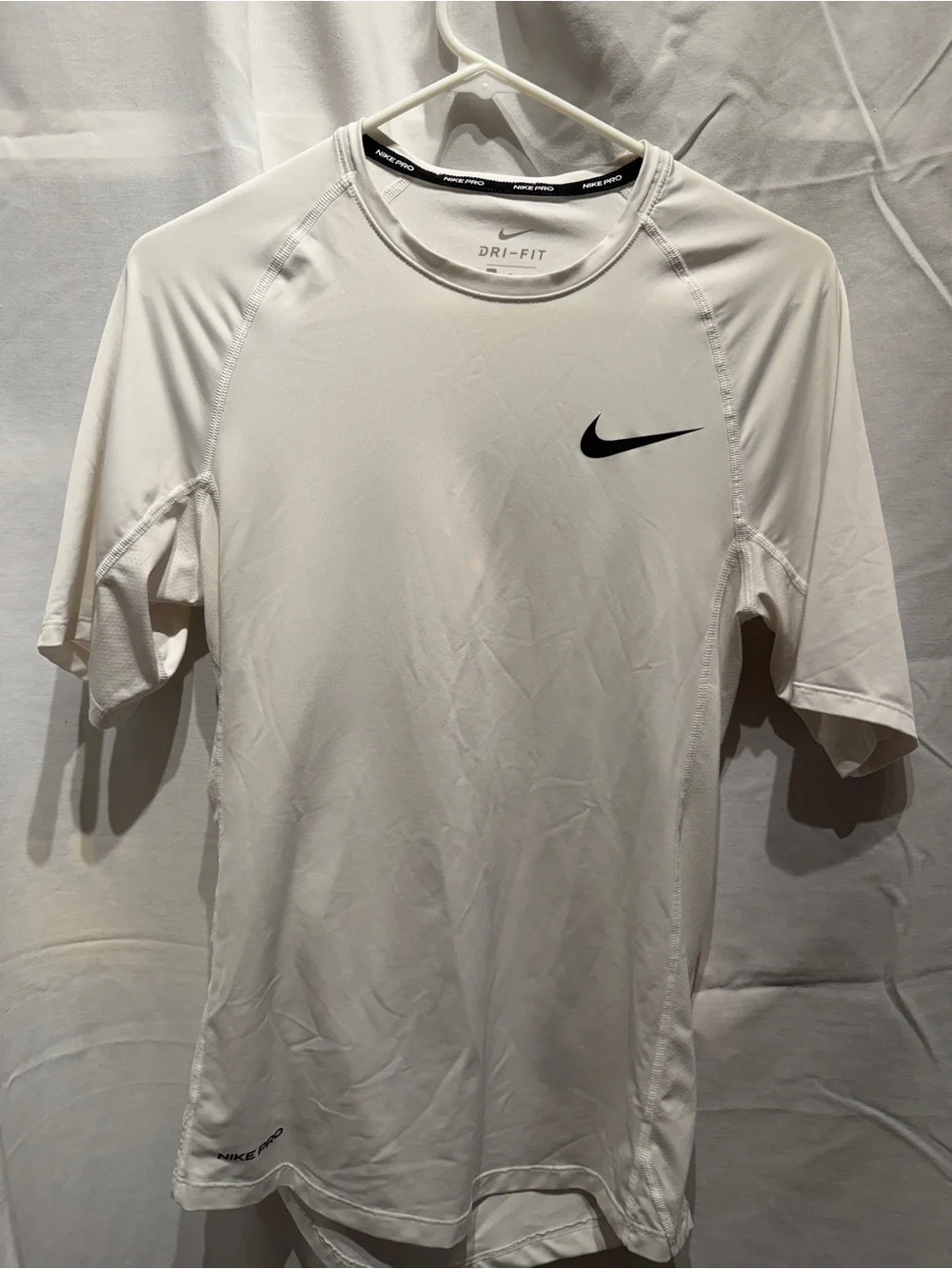 Nike White Short-Sleeve Dri-FIT Training Tee with Black Swoosh